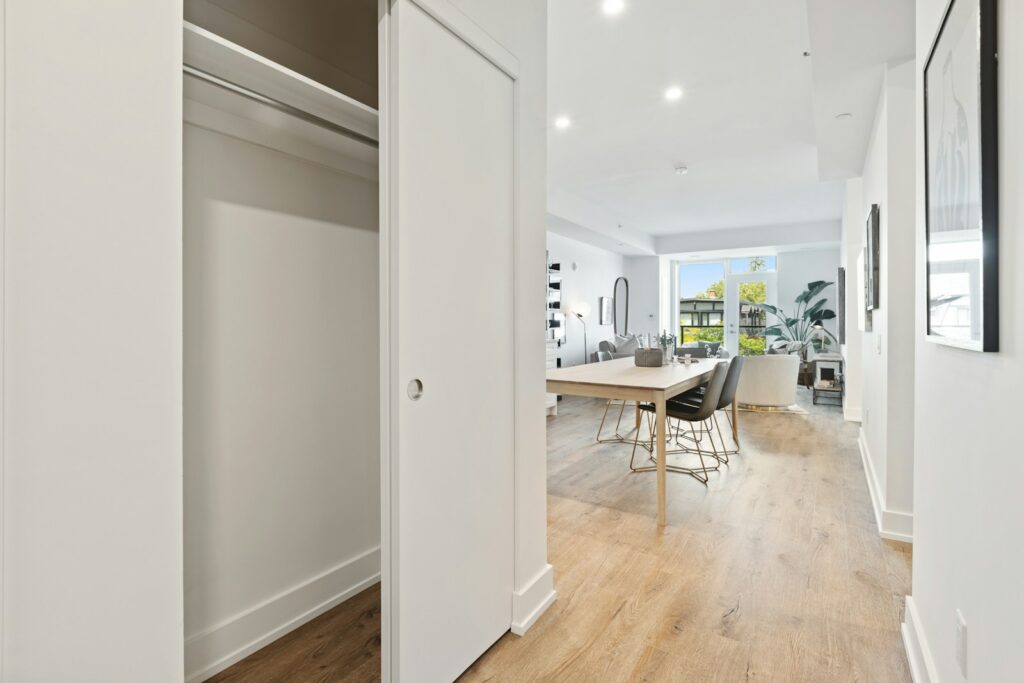 white wooden table near white wall